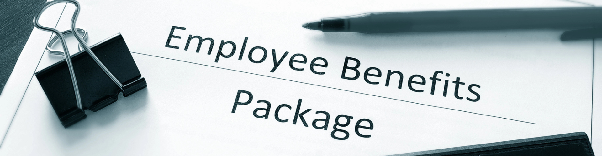 Employee benefits package sitting on a desk
